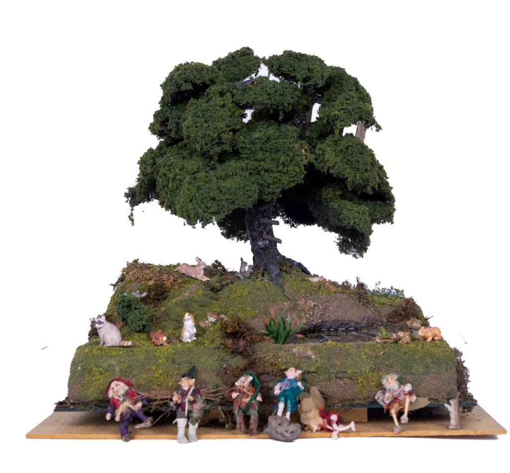 Fairy Folk Tree House Shadowbox Dollhouse: English countryside fairy folk tree house shadowbox dollhouse. This one-of-kind nature scene features a mossy forest floor and stream, animal and fairy figurines, and a beautiful leafy tree with a tre