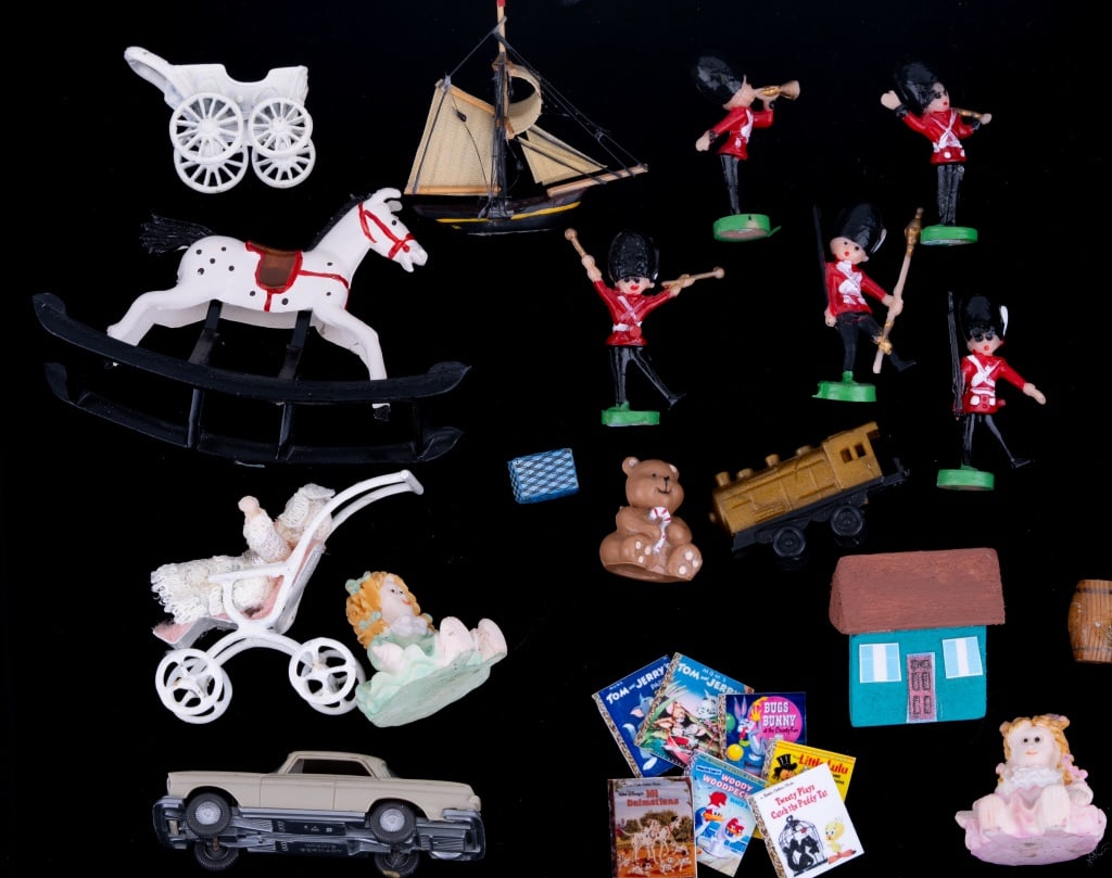 Toys for Children's Bedroom Dollhouse Miniatures: Features rocking horse (approximate dimensions 1 7/8" high x 2 7/8" long x 1 1/4" wide), two ceramic dolls, five toy soldiers, a teddy bear, a matchbox car (approximate dimensions 1/2" high x 2 1/4" l