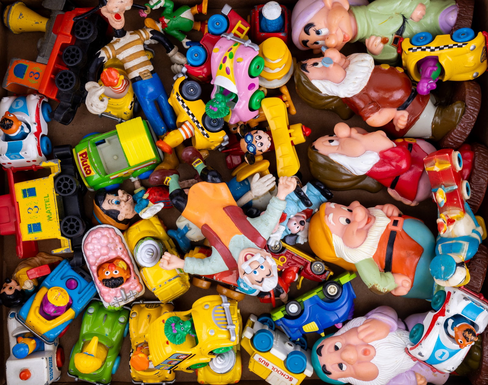Disney, Muppets, Sesame Street & Other Toys: Disney, Muppets, Sesame Street and other toys, Three Dwarves from Snow White squeaky toys, bendy toys, walking figurines, toy cars and more as seen in photos.