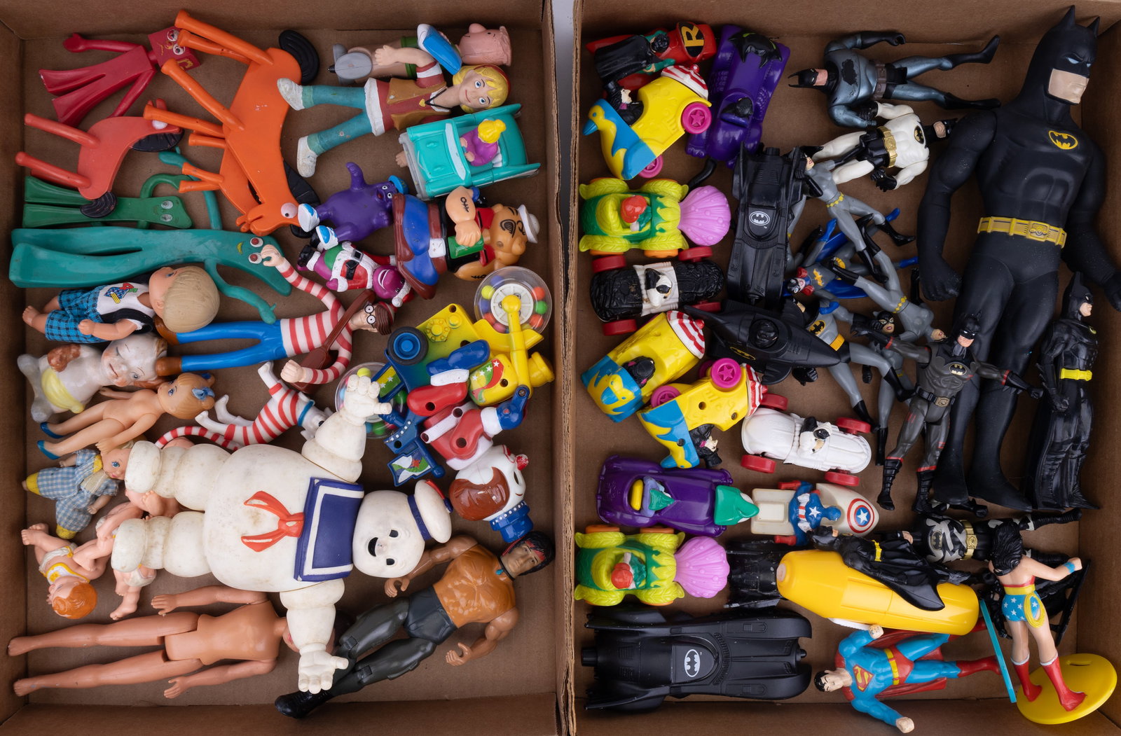 Action Figurine Grouping: Two groups of action figures and toys including Batman, Wonder woman, Rambo, Gumby, Barbie, Superman and more.
