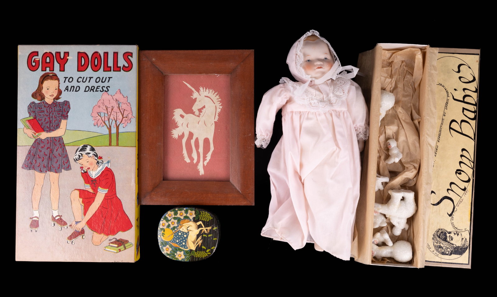 Cut Out Dolls, Snow Babies & Unicorns: NIB cut out an dress "Gay Dolls", Snow babies set #432, porcelain doll, unicorn cut out art, and unicorn box.