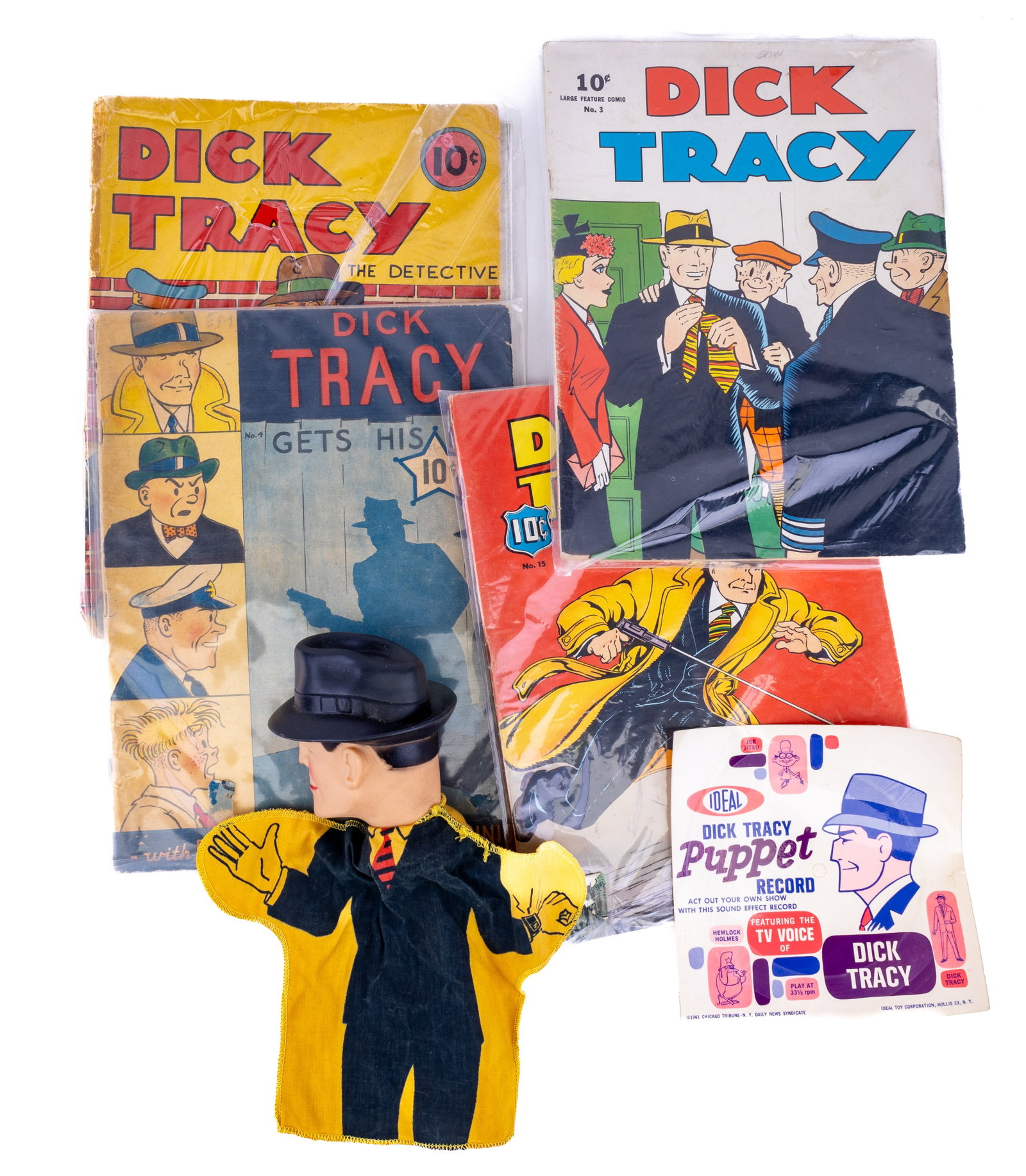 1930s-60s Dick Tracy Comic Books & Toy: 1930s-60s Dick Tracy 10 cent comic books including Dell Publishing Company Nos 3, 4, 15 and Feature Books No 4. Also includes 1961 Ideal Dick Tracy Puppet. Record not included.