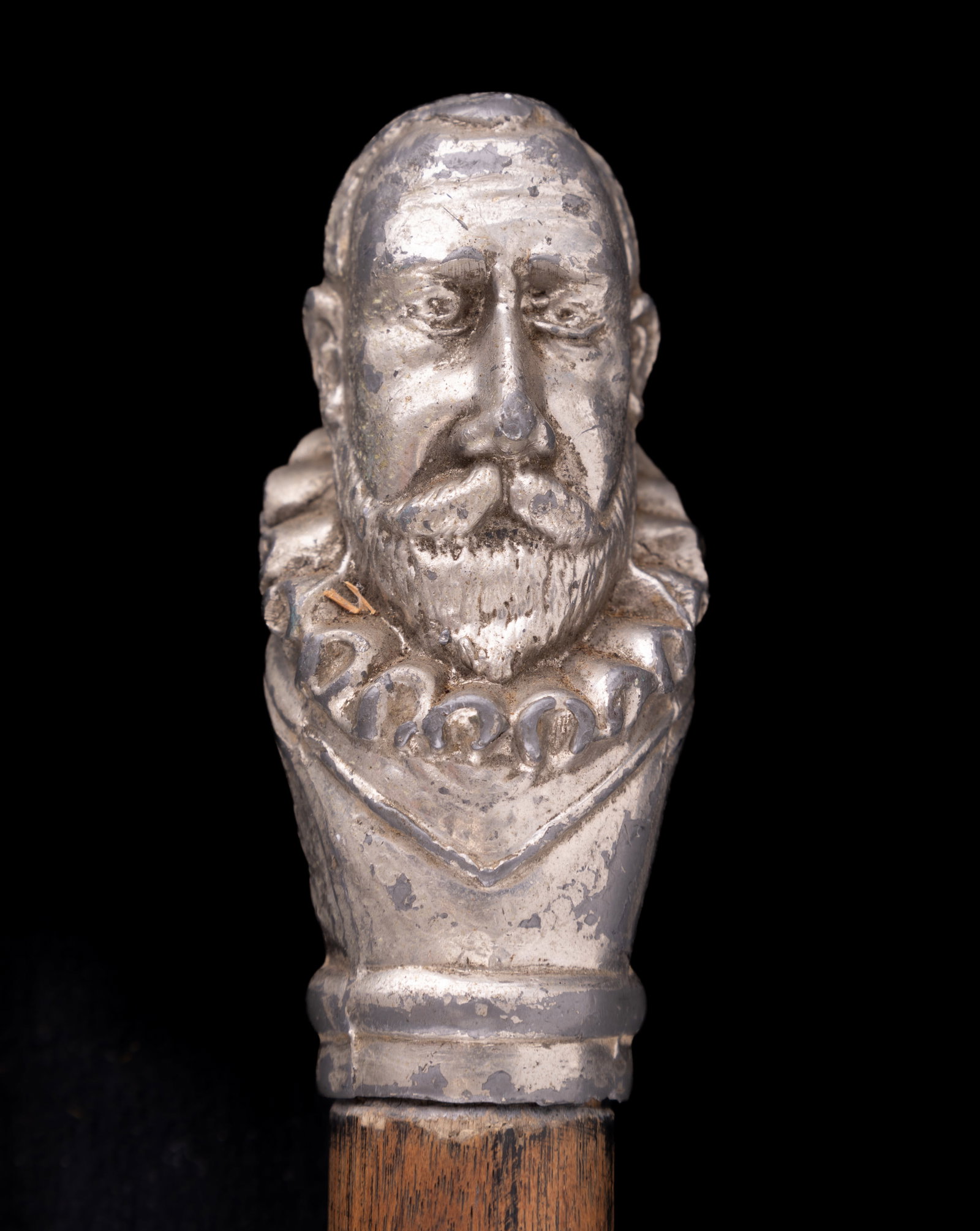 Christopher Columbus Exposition Presentation Cane: Presentation cane with pot metal bust of Christopher Columbus on the top and dated 1492 and 1892, commemorating the World's Columbian Exposition. Wooden cane is possibly missing the tip. Columbus is s