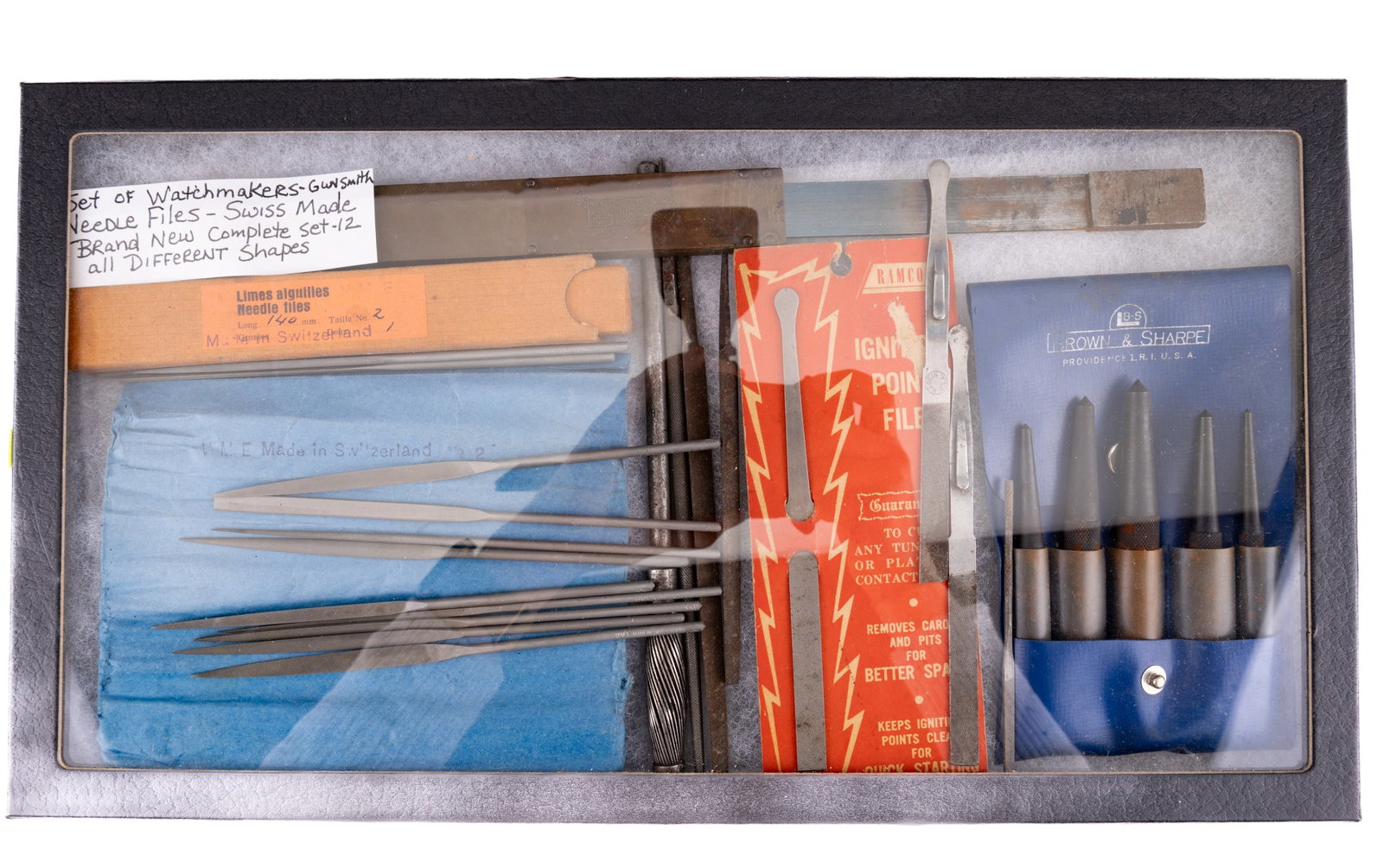 Watchmaker and Gunsmith Filing Tools: Grouping includes a set of (12) Swiss needle files in original packaging, ignition point files, drifts, and a Martindale electronic tool.
