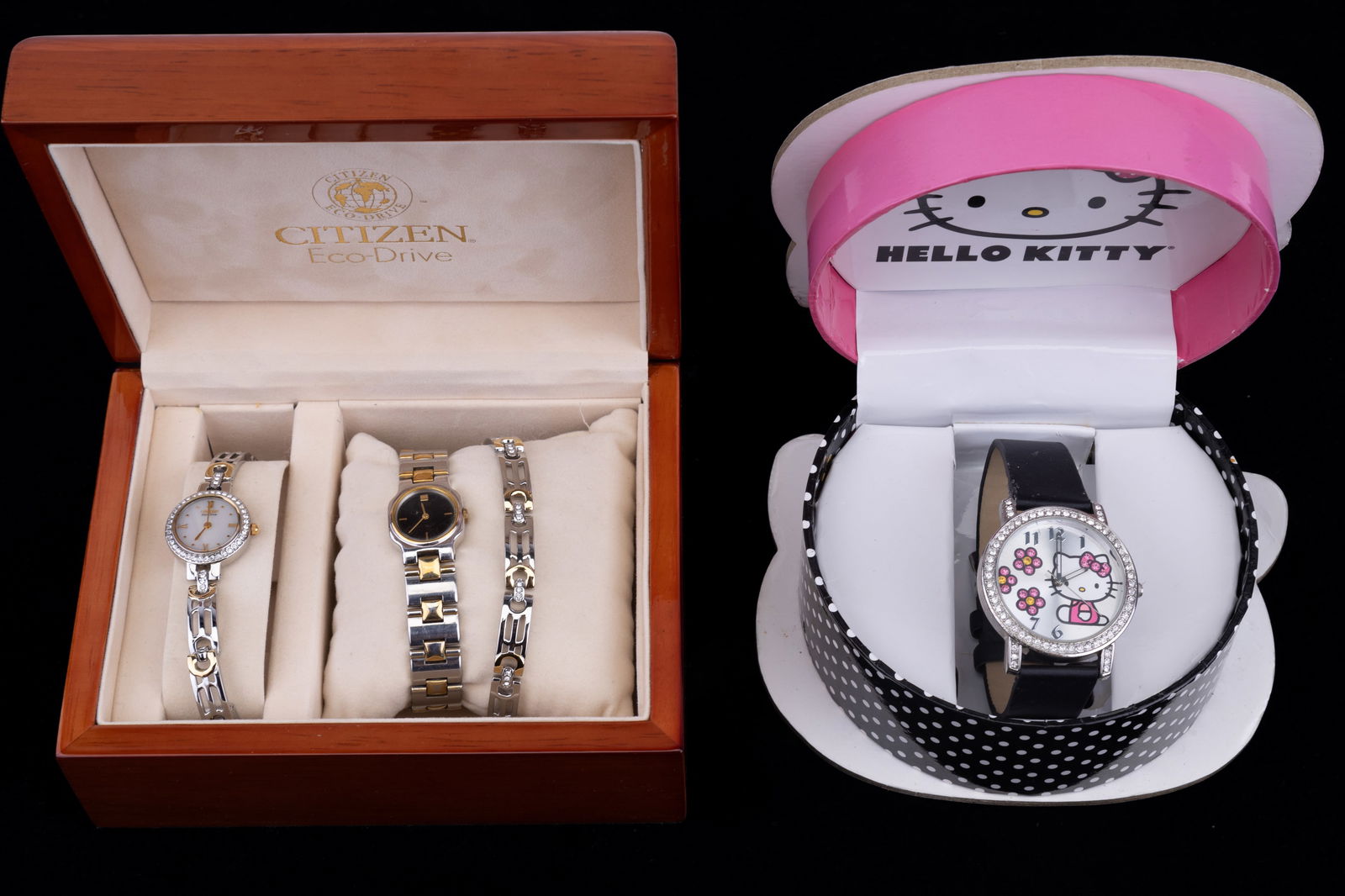 Hello Kitty & Citizen Eco-Drive Watches: Hello Kitty Sanrio watch and Citizen eco-drive watch. One in box with bracelet. Both in as-is condition.