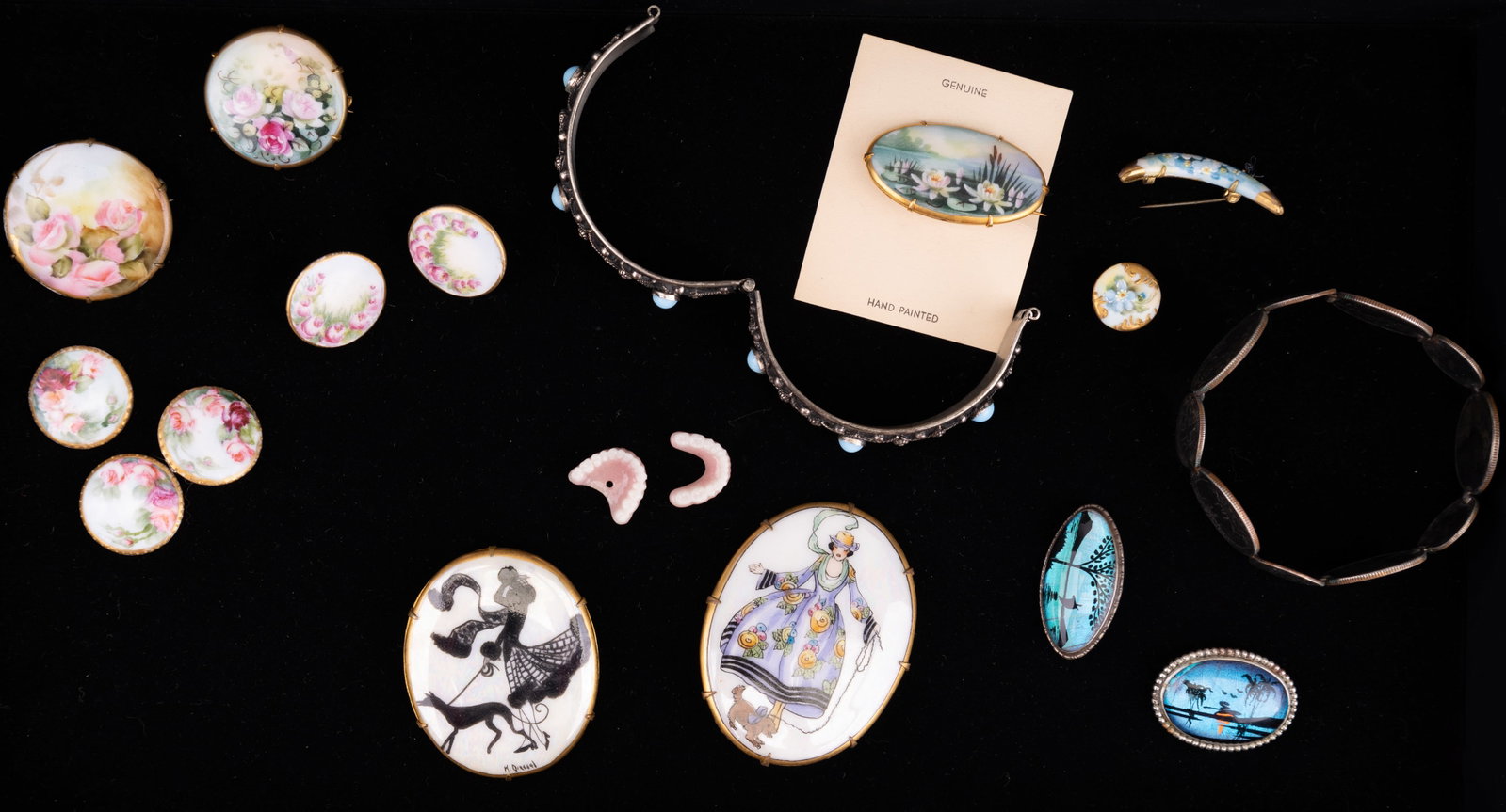 Vintage Estate Jewelry: Sampling includes an Art Deco "Koressel" dog themed handsome lady hand painted porcelain brooch, butterfly wing brooches, a sterling turquoise style bracelet, American quarter and dime bracelet (most 