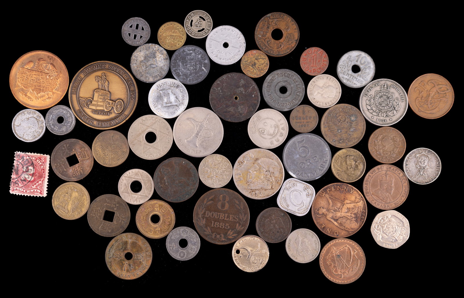 International Coins and Tokens: Variety of international coins and tokens including Africa, Pakistan,Kuwait, Denmark, Brazil, Asia and more.