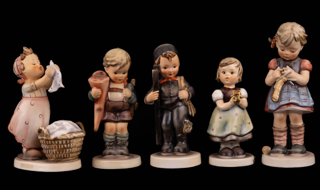 Hummel Goebel Figurines: 5 West German hand-painted porcelain Hummel figurines by Goebel. Dated from late 1940s to 1990s. Designs include Little Scholar, For Mother, Chimney Sweep, Wash Day (1957), and Stitch in Time (1963).