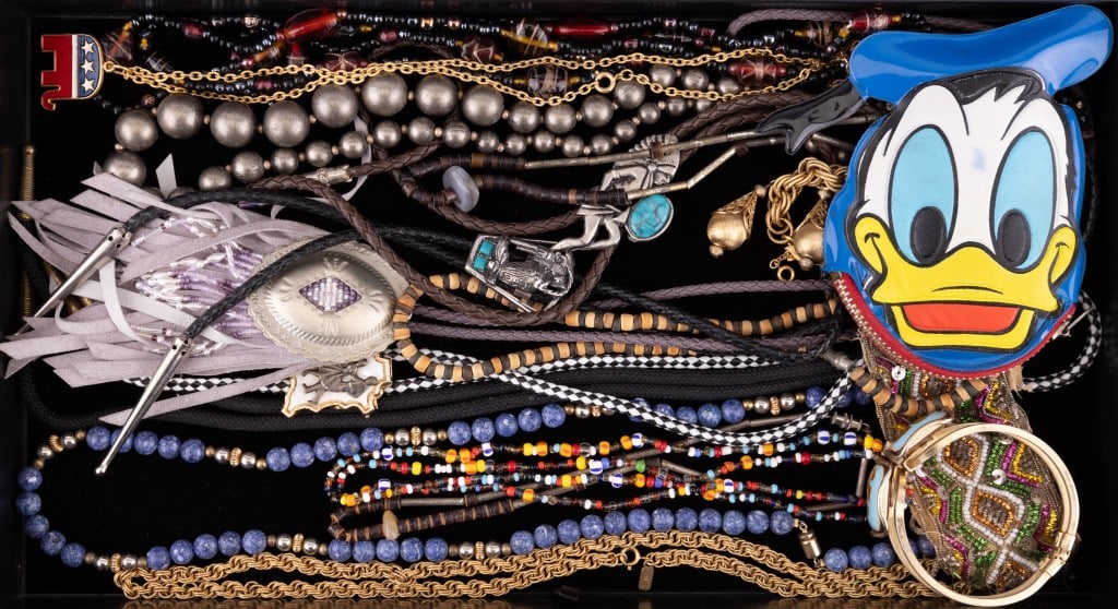 Bolos, Early Disney & Vintage Jewelry: Southwest style bolos, vintage Donald Duck Disney wallet, hand beaded necklaces, gold tone Monet and more.