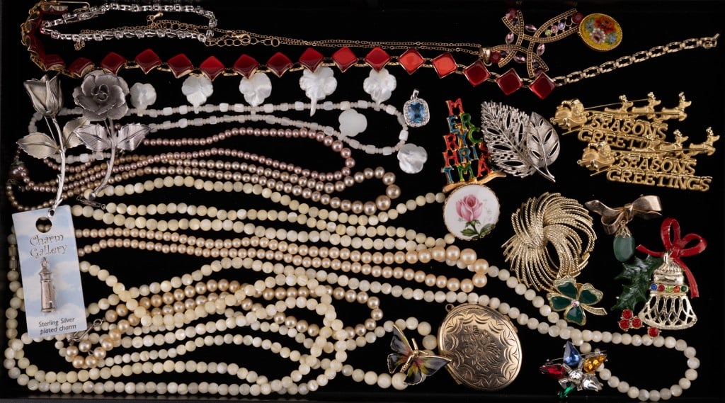 Vintage Estate Jewelry: Includes pearl and mother of pearl design necklaces, Christmas and holiday brooches, lucite necklace, micromosaic pin and more.