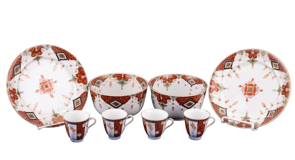 Japanese Imari Bowls, Plates & Tea Cups: Japanese Imari porcelain including 4 tea cups, two bowls and 2 plates. Plates measure approx 8 1/4" dia. Bowls measure approx 3 1/2" H x 6 1/4" dia. tea cups measure approx 2 1/2" dia x 2 1/2" H. Hall