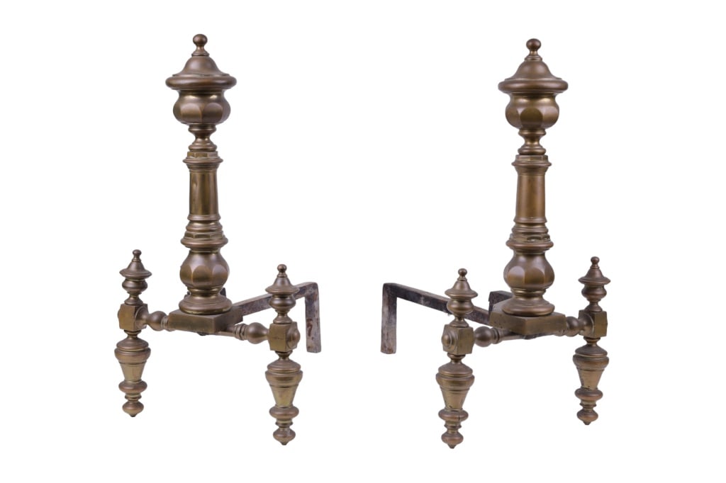 Antique Brass & Iron Andirons: Antique brass and iron andirons constructed with a hand wrought threaded and hand peened termination. Measure approx 23" H x 12 1/2" W x 24" D. Some separation at seam to one finial.