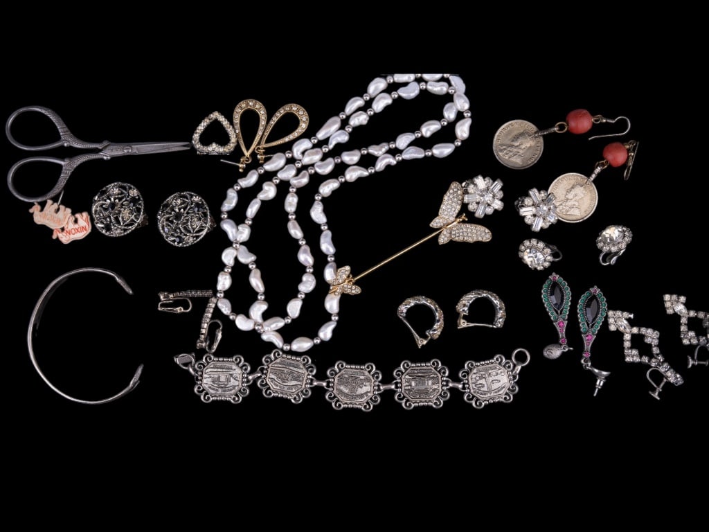 Vintage Estate Jewelry: Long pearl design necklace, butterfly crystal rhinestone stickpin, rhinestone and coin style 1953 earrings and other designs of jewelry.