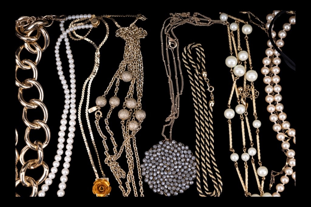 Money, Marvella, Sterling & More Costume Jewelry: 10 gold tone necklaces including one marked Marvella, another marked Monet, sterling silver chain with gold wash and more.