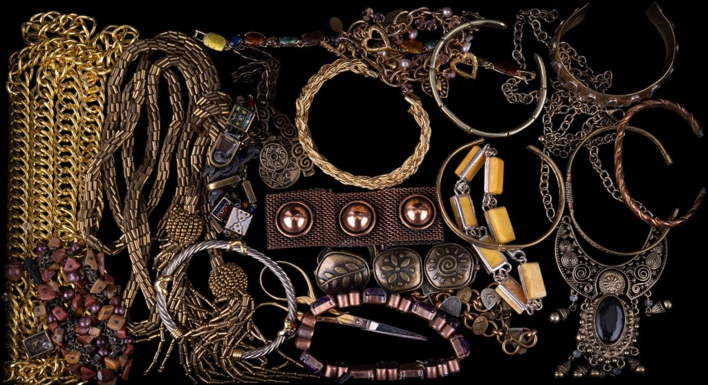 Gold Tone Necklaces & Bracelets: Gold tone jewelry lot of necklaces and bracelets. There are also 3 cuff bracelets that include copper.