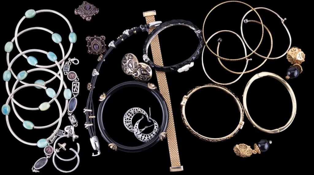 Costume Jewelry Bracelets & Earrings: Gold tone and silver tone costume jewelry bracelets and earrings.