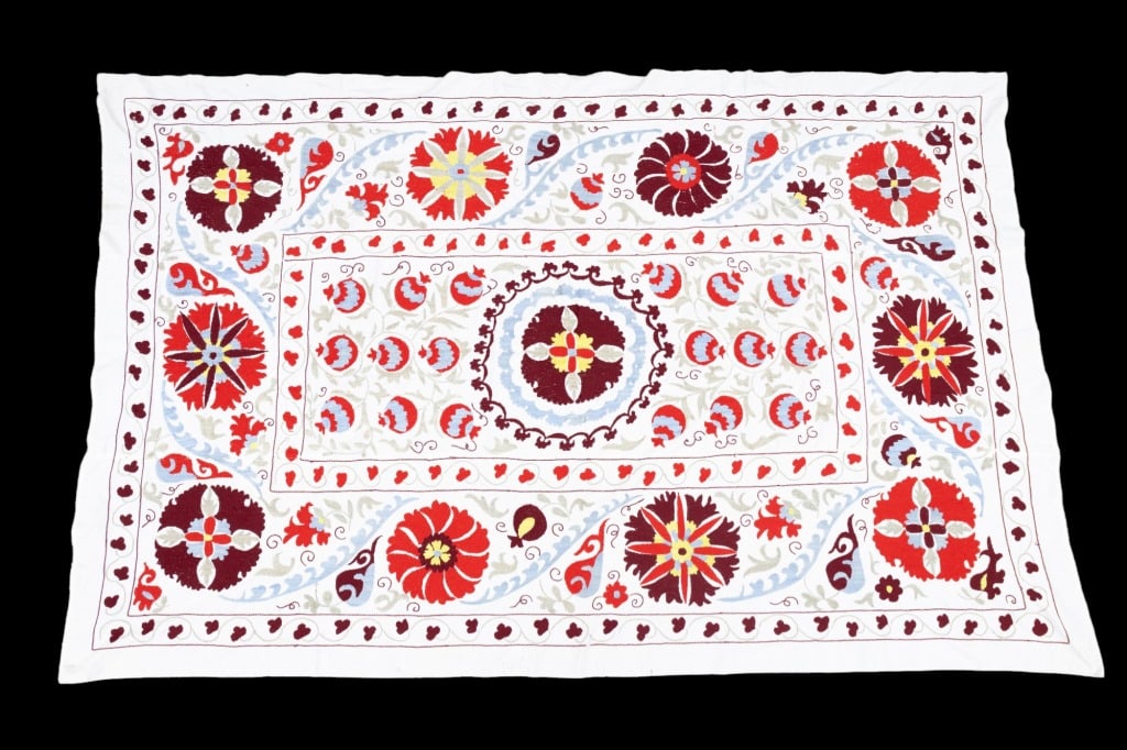 Suzani Silk & Linen Hand-Knotted Carpet: Suzani silk and linen hand-knotted carpet or tapestry measuring approx 4'6" x 6'10". Beautiful detail in the stitching / embroidery.