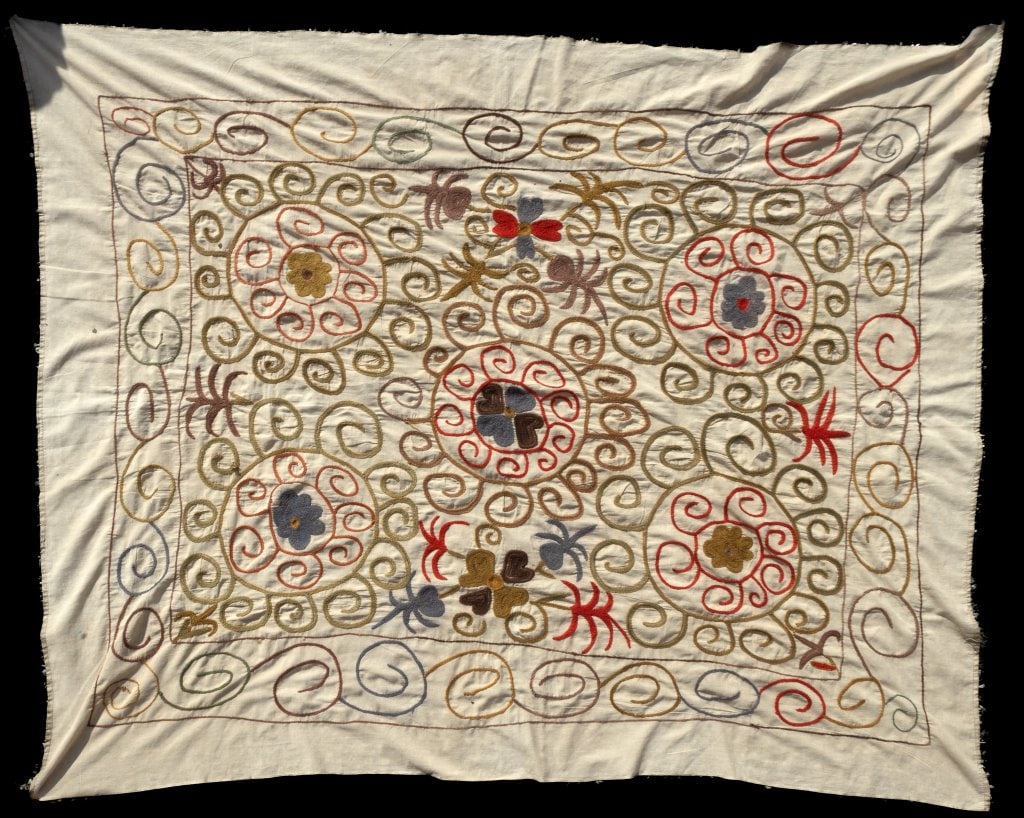 Suzani Silk & Linen Hand-Knotted Carpet: Suzani silk and linen hand-knotted carpet measuring approx 4'4" x 5'5". Beautiful detail in the stitching / embroidery.