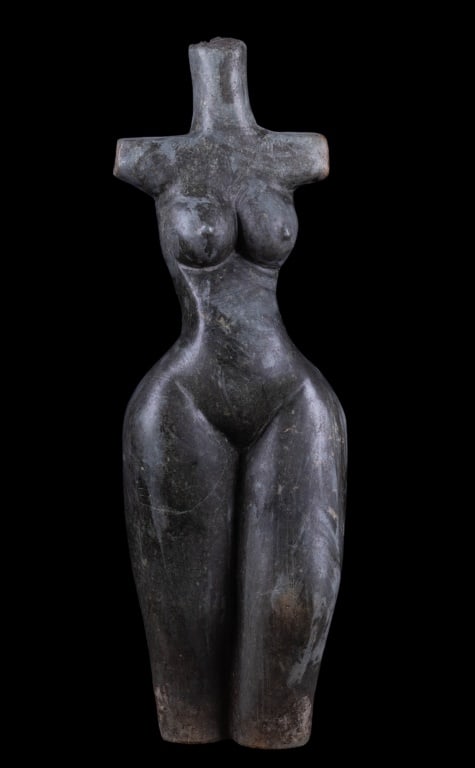 Modernist Stone Statue of a Woman: Significant artisan figural statue showing the torso of a woman made of polished stone. Measures approx 30.5" H x 10" W x 8" D. Weighs approx 93 lbs. Pickup and shipping should be considered due to we
