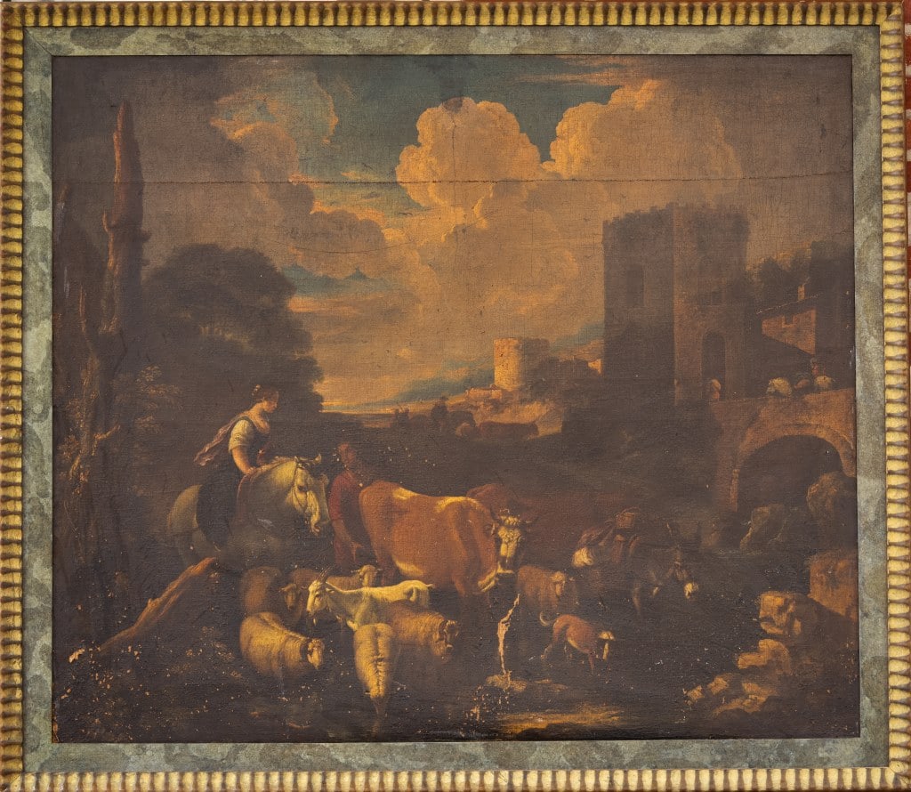 Large 18th C Oil on Canvas Pastoral Scene: Large 18th C oil on canvas depicting castle and pastoral scene with cows, farmers, woman on horseback, sheep, goats, donkey and more. Measures approx 50.5" x 58.50". The painting has a seam mark in th
