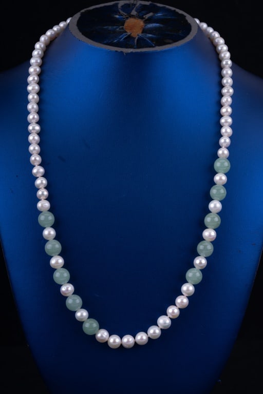 Jadeite & Pearl Necklace: Jadeite and pearl necklace with sterling clasp measuring approx. 22? L.