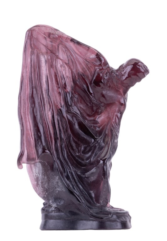 Daum Purple Crystal Sculpture of Man: Large purple crystal sculpture made and signed by Daum and formed / carved in the shape of a robed figure throwing a discus. Base signed by artist O. Bua. Felted bottom. Measures approx 14" H x 8" L x