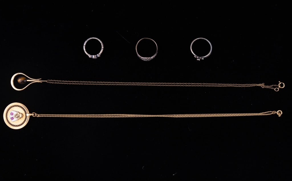 Gold Filled Necklaces & Sterling Silver Rings: Includes 2 gold filled necklaces and 3 sterling silver rings. One gold filled necklace (approx 17" L) has tiger eye stone and the second GF necklace has "BK" on the pendant and two rubies.