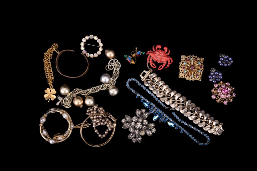 Weiss and Other Estate Jewelry: Weiss and Other Estate Jewelry including Weiss sparkling silver hue Maltese design brooch, a Coro pearl, gold hue bracelet, and multi hue screw back earrings, a large Gerrys crab brooch and other item