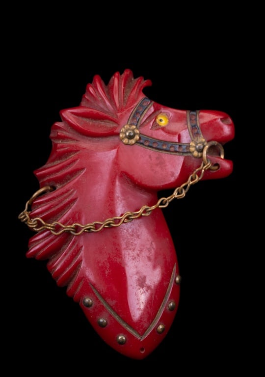 Rare Bakelite Horse Brooch: Antique large red Bakelite horse head brooch with detailed mane and fancy horse bridle