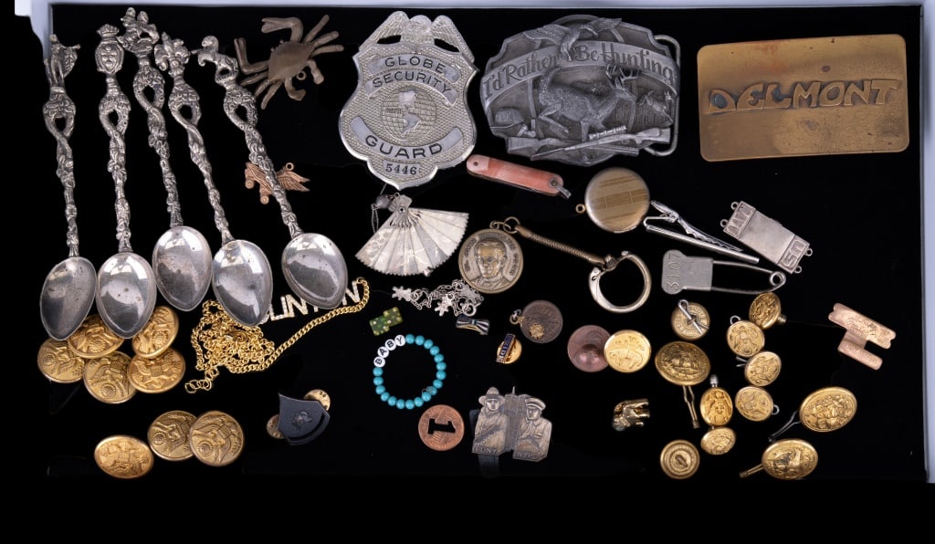 Eclectic Buckle, Button & Military Items: Early Waterbury buttons, sterling silver US Navy locket, FDNY NY twin tower tribute pieces, SiskiYou Buckle Company ID, rather be hunting, security badge, Clinton crystal necklace, and others