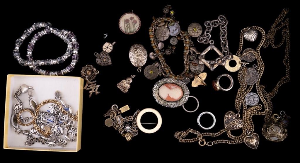 Costume Jewelry Bracelets, Pendants etc: Costume jewelry including 10 bracelets of which 5 are Anne Klein, 7 pendants, 2 pins, 4 rings and 2 necklaces, silver and gold colored.