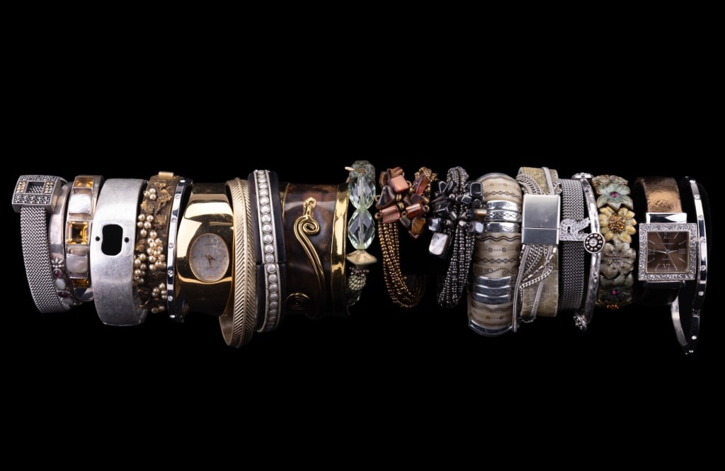Bangle Bracelets: Bangle bracelets including cuff, stretch and watch cuff bracelets (watches are Anne Klein and Vernier), some with beads, silver and gold colored.