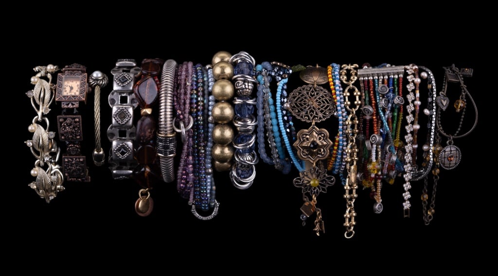 Large Lot of Costume Bracelets: Large lot of costume jewelry bracelets of various types. Bangles, dangles and more.
