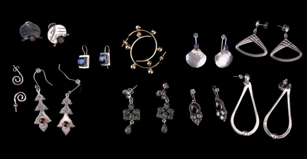 Sterling Silver Earrings (10): 10 pairs of sterling silver earrings including some with stones that test in the range of garnet, labradorite, nephrite and amethyst. Square earrings with blue stone are marked Mexico.