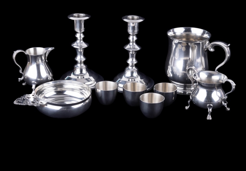 Stieff Pewter Grouping (30+): Collection of Stieff pewter including Williamsburg creamer, sugar bowl, porringers (2), and mugs (2), Old Sturbridge Village candlesticks (2 pairs), and Jefferson cups (24).