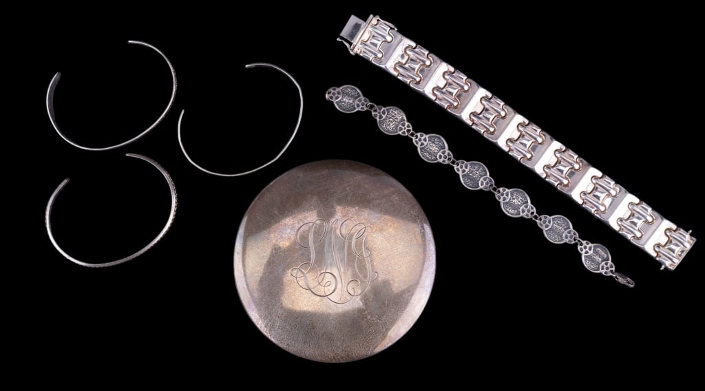 Sterling Silver Bracelets & Lid: 6 pieces of sterling silver jewelry and more. There are 5 bracelets including 3 cuff bracelets and 2 dangle bracelets. There is also a monogrammed sterling vessel lid.