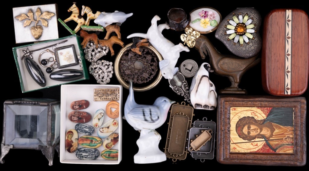 Figurines, Jewelry Boxes, and Beads: Figurines, Jewelry Boxes and Beads including a cast bronze gull paperweight, religious icon figurines marked Royal Doulton penguin, Dog with puppy marked Germany, carved small wooden figures, bird mar