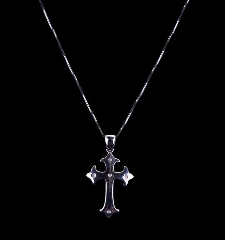 14K Italian White Gold Cross and Chain: 14K white Italian gold cross and chain. Chain approx 19" L with cross approx 1 1/4" drop. Cross has 5 accent diamonds. Total weight approx 6.1g.