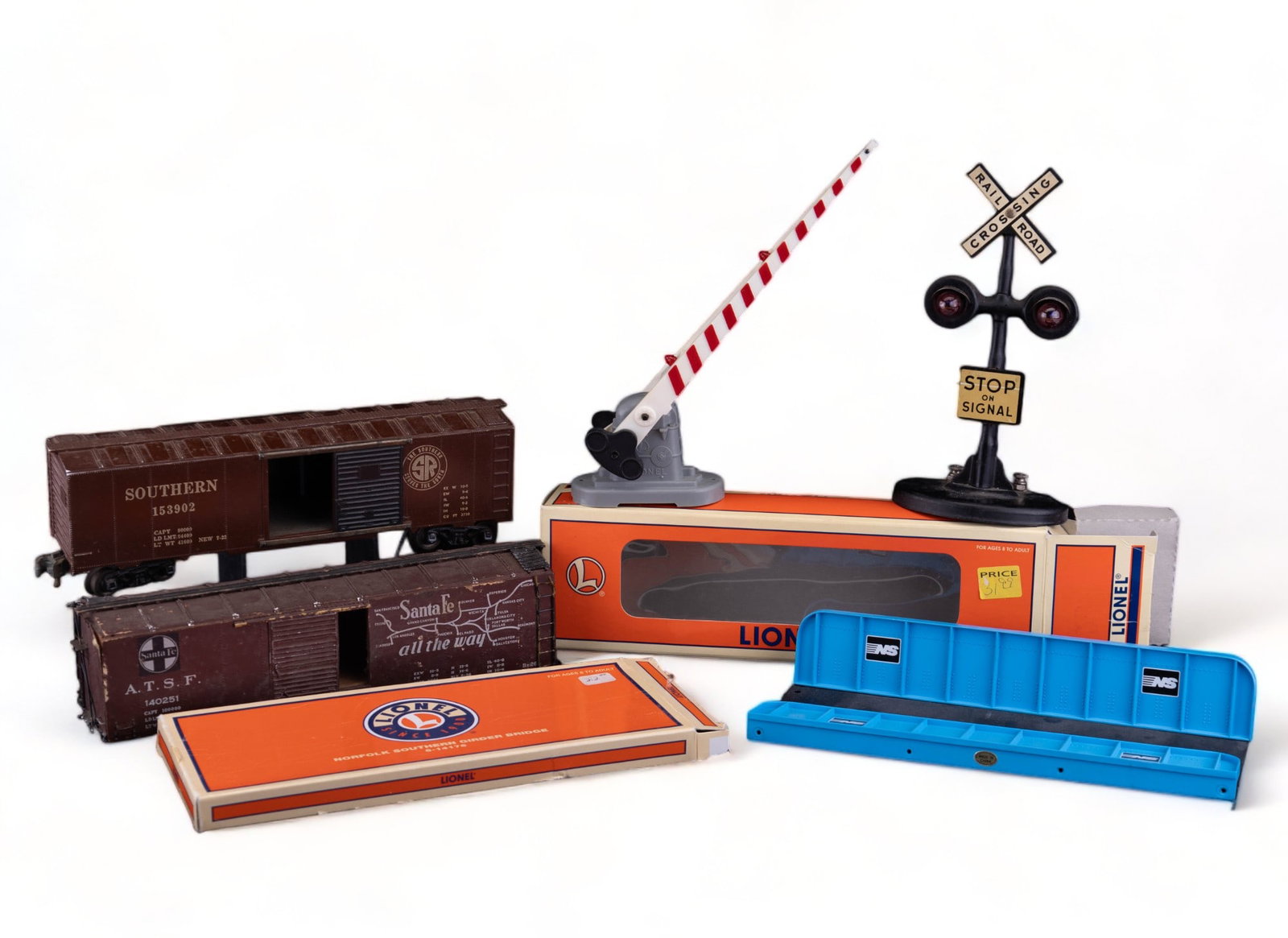 Lionel Model Train Accessories & Others: Lionel Norfolk Southern Girder Bridge (6-14176), Lionel automatic crossing gate (6-12714) - both with original boxes. There is also a tin litho railroad crossing light and two box cars (one is wooden 