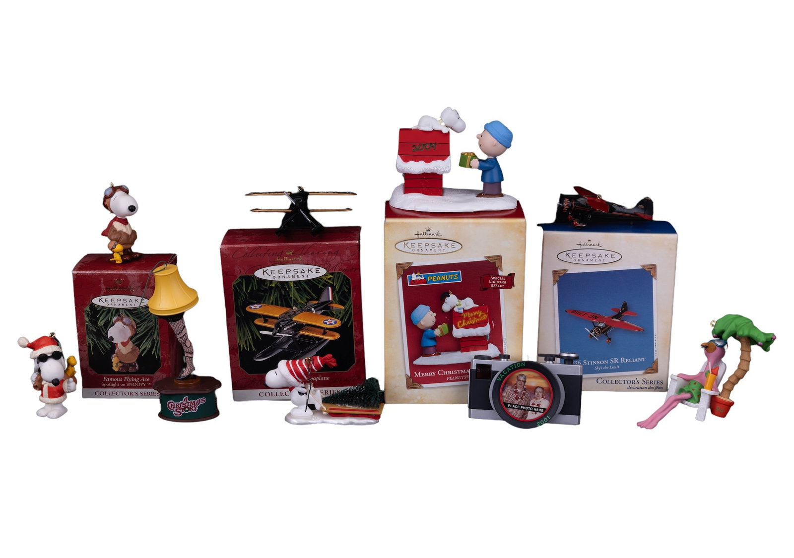 Hallmark Keepsake Christmas Ornaments (9): Nine Hallmark Keepsake ornaments including Snoopy, planes and more.