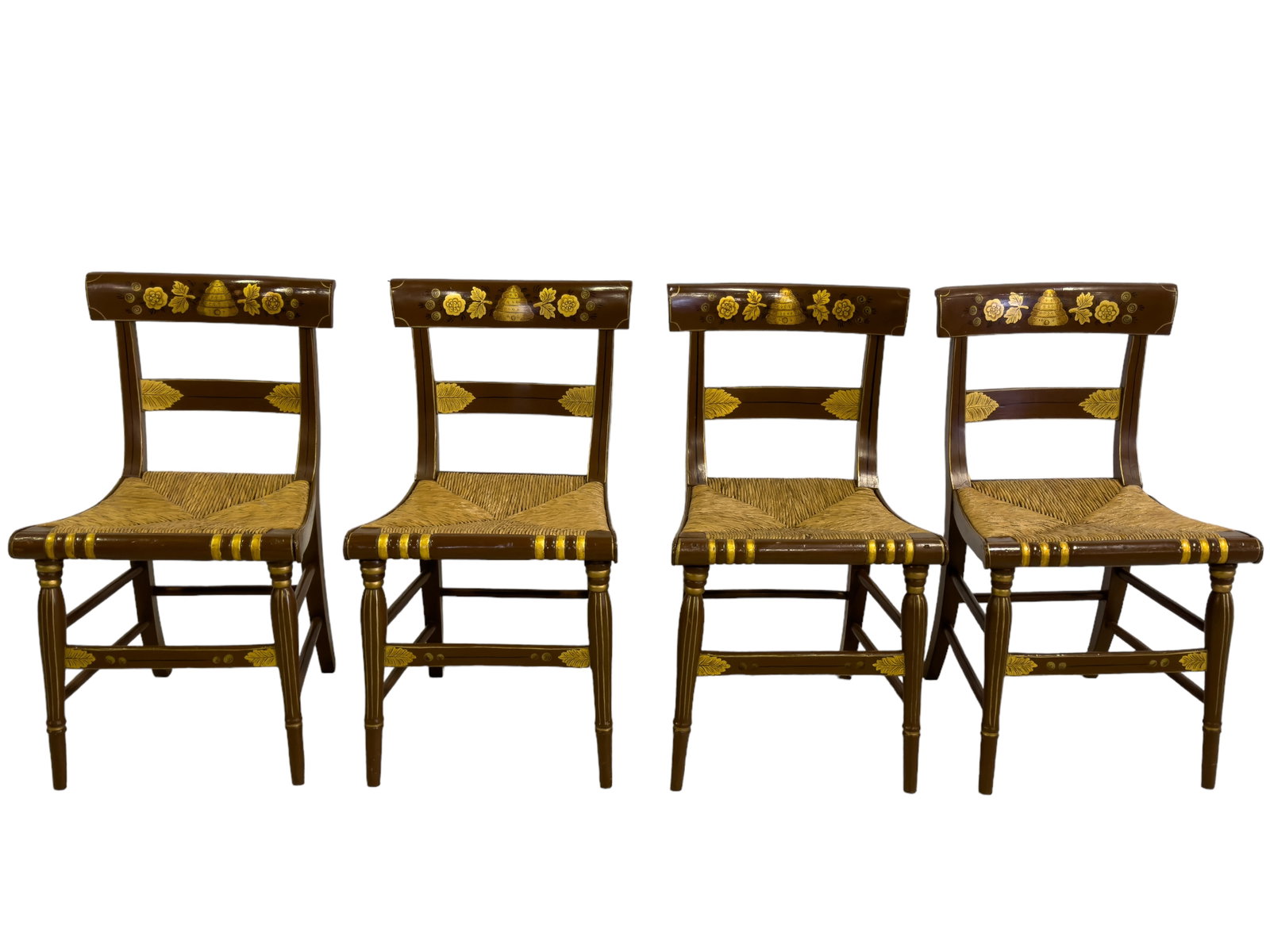 Rush Seat Side Chairs w/ Beehive Decor: Three rush seat side chairs with painted beehive and floral scene in gold paint. One chair has some nails exposed on front edge. Chairs measure approx. 32? high, 18? across, and 19? deep. Paint still 