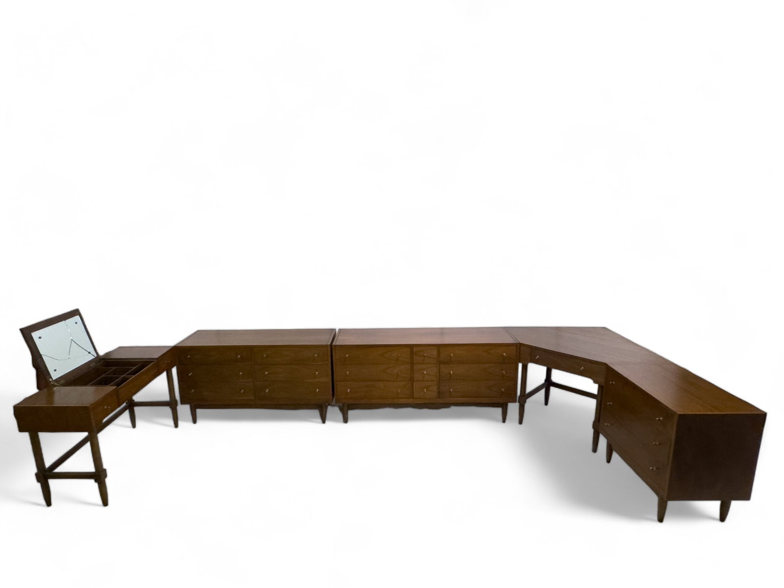 5 Piece Bedroom Set by National Furniture Co.: A five piece mid century modern bedroom set from National Furniture Company. Measures approx. 30.25? high, 63? across, and 19? deep (largest piece).Vanity dresser has broken glass.