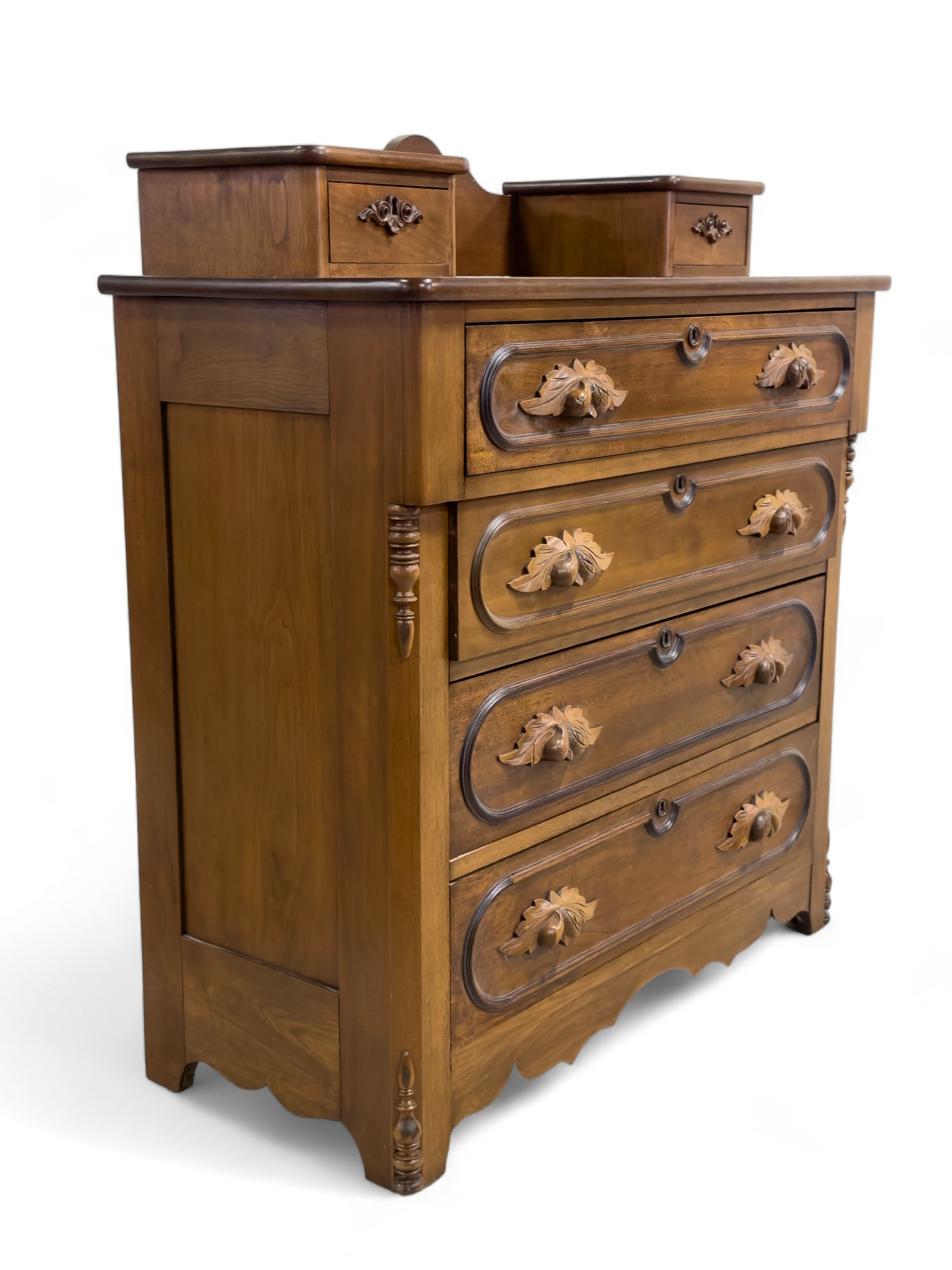 Victorian Chest of Drawers w/ Molding: A Victorian chest of drawers with molding. Key is included, and piece measures approx. 46? high, 41? across, and 19? deep.