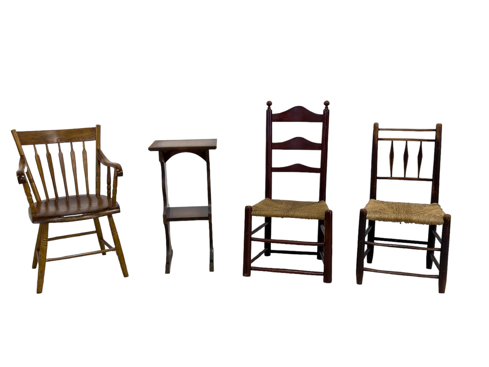 Antique/Antique Style Chairs, Side Table: Grouping includes a wicker bottom chair, a rush bottom ladder back chair, an armchair made from different wood, and a birds eye maple veneer shelf stand with art on black background. Shelf stand has s