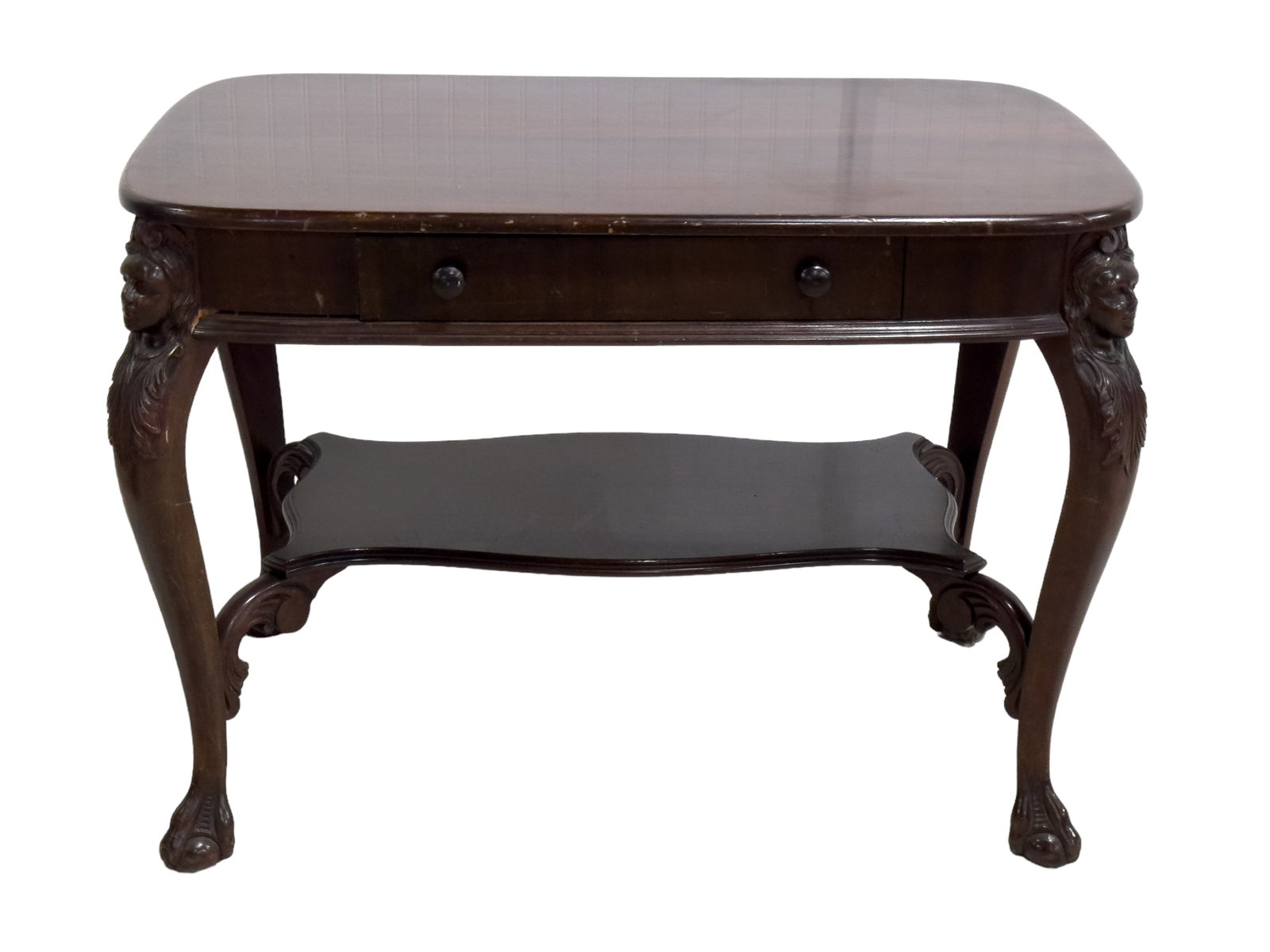 Hall Table w/ Figural Carvings: An Early 20th century hall table with beautiful carvings on each corner of a woman. Table has claw feet, and an extra shelf beneath tabletop. Table measures approx. 29.5? high, 40? wide, 27.5? deep.