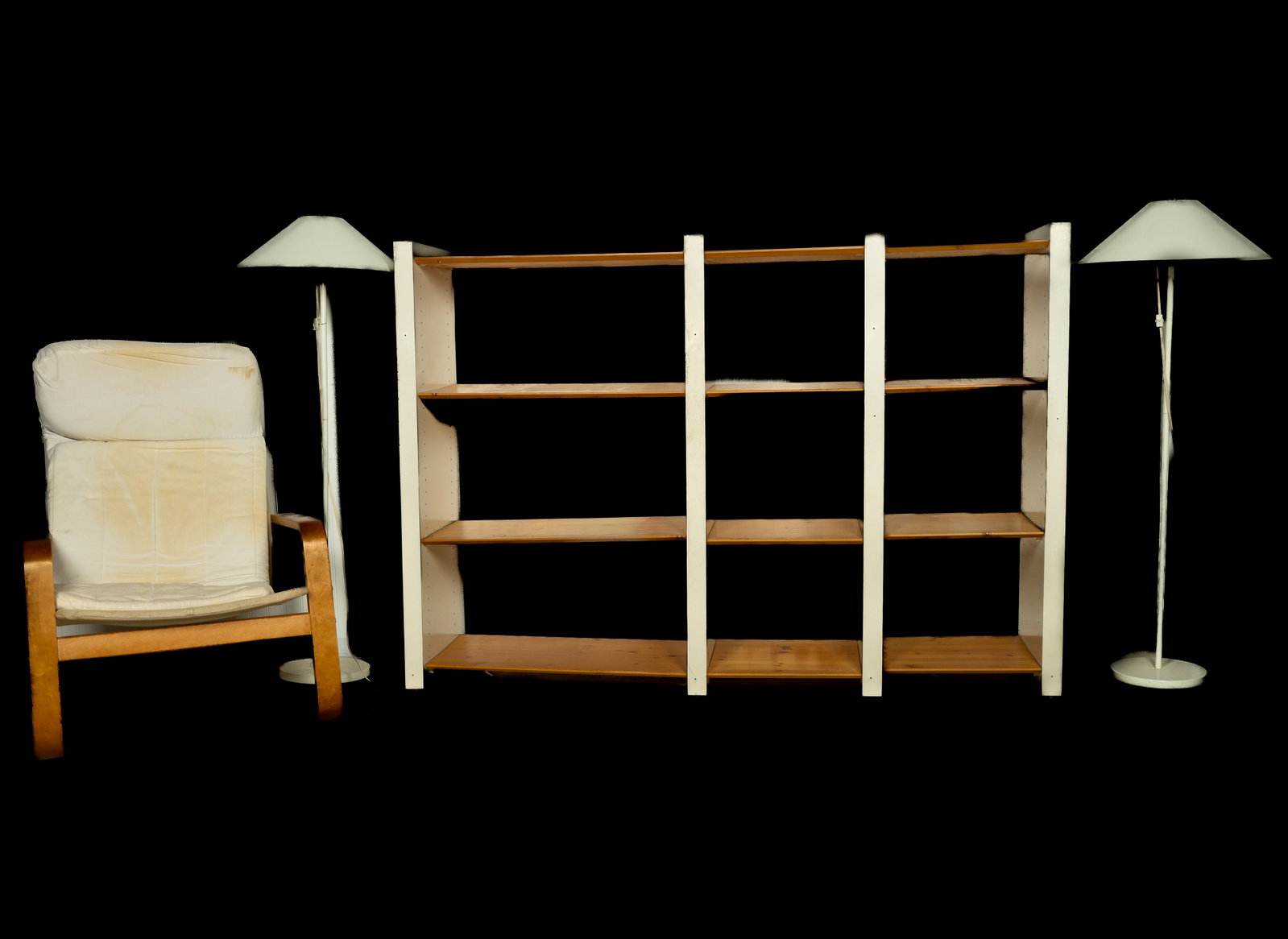 Ikea Lounge Chair, Lamps, & Shelving Unit: Ikea lounge chair, a pair of lamps, and a shelving unit. Modern style. Stains on chair cushions. Chair measures approx. 36 1/4" H x 27" W x 32" D.