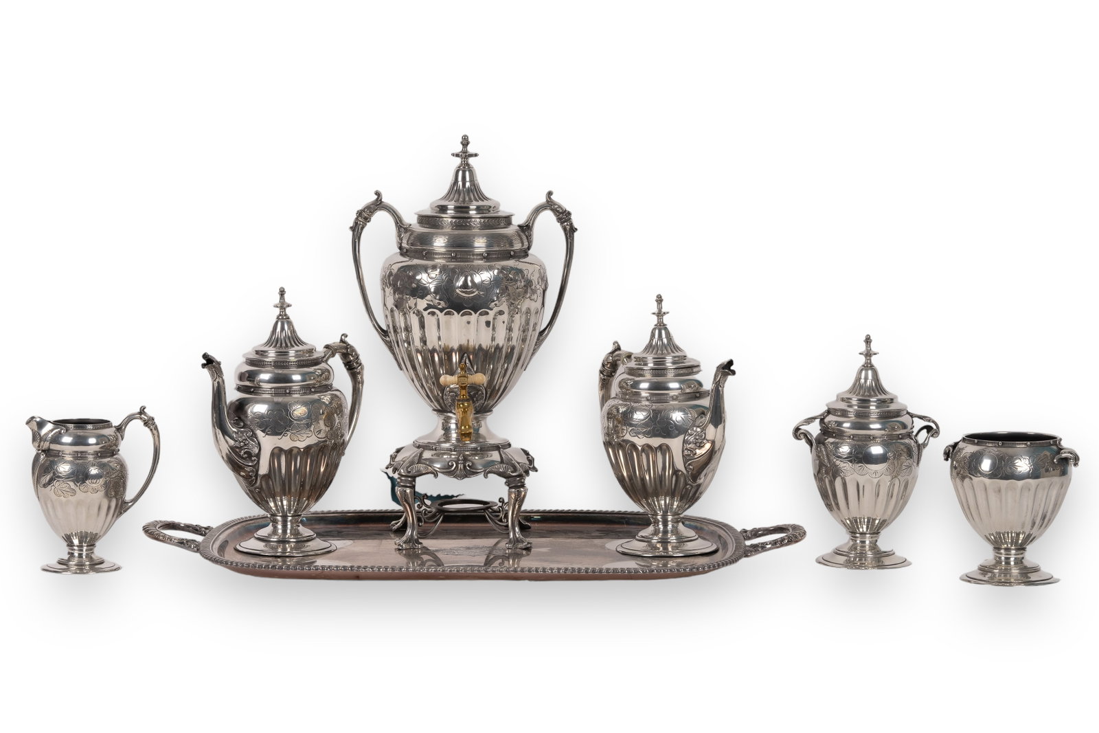 Victorian Silver Plated Coffee / Tea Service: Victorian silver plated coffee / tea service including tray, samovar, coffee, tea, waste bowl, sugar and creamer. Samovar measures approx 16" H and the coffee / tea pots approx 10.5" H. All unmarked. 