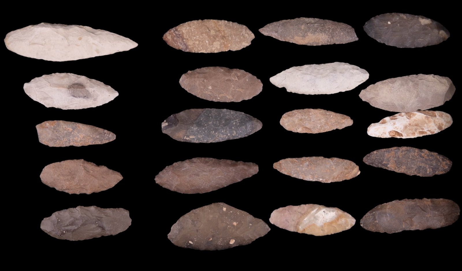 Neolithic Flint Knives, Morocco (20): 20 Neolithic thin biface flakes knives in flint and chert. Collected near Ain Leuh, Morocco. Longest blade approx 3 7/8" L. Age: 5,000 to 8,000 years old.