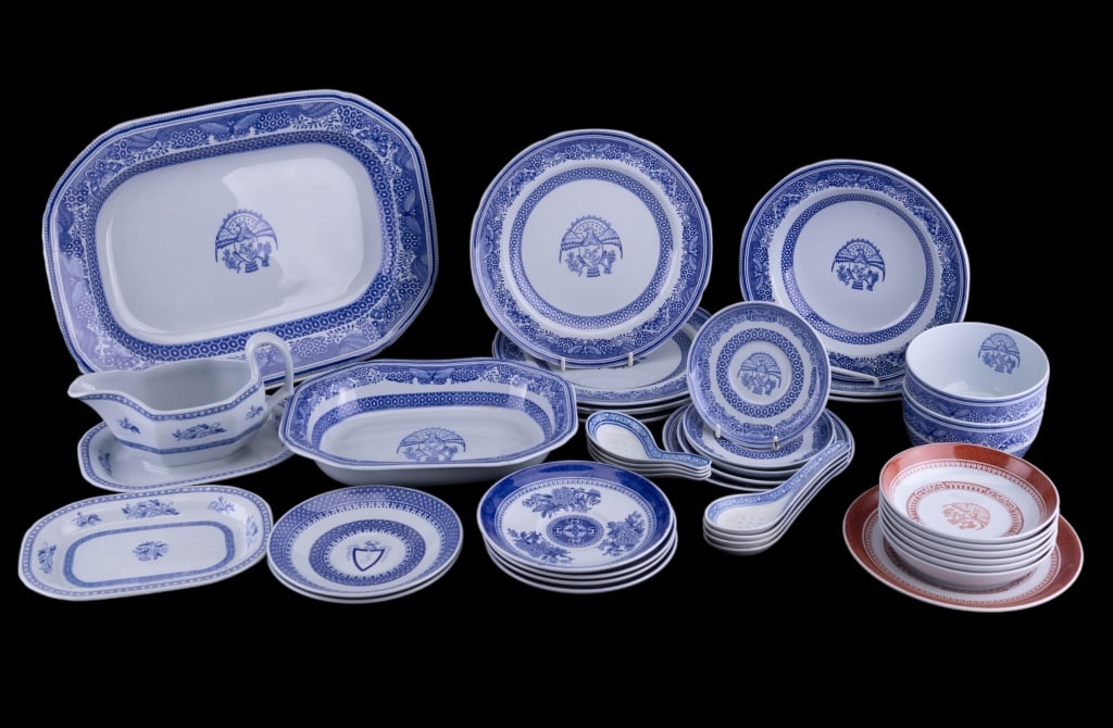 Spode Copeland Sets: Spode Copeland including a blue set and a red set. Blue set includes (3) soup bowls, (2) rice bowls, gravy boat, (8) spoons, (5) dinner plates, (8) large saucers, (3) small saucers, platter, serving b