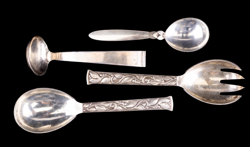 Jensen Sterling and Other Silver Spoons (4): Lot of four silver spoons including 2 Evald Nielson 830 silver hallmarked and inscribed Copenhagen Sept 1938 (approx 138 g) (serving spoon / fork), a "Georg Jensen" sterling silver spoon (Denmark, app